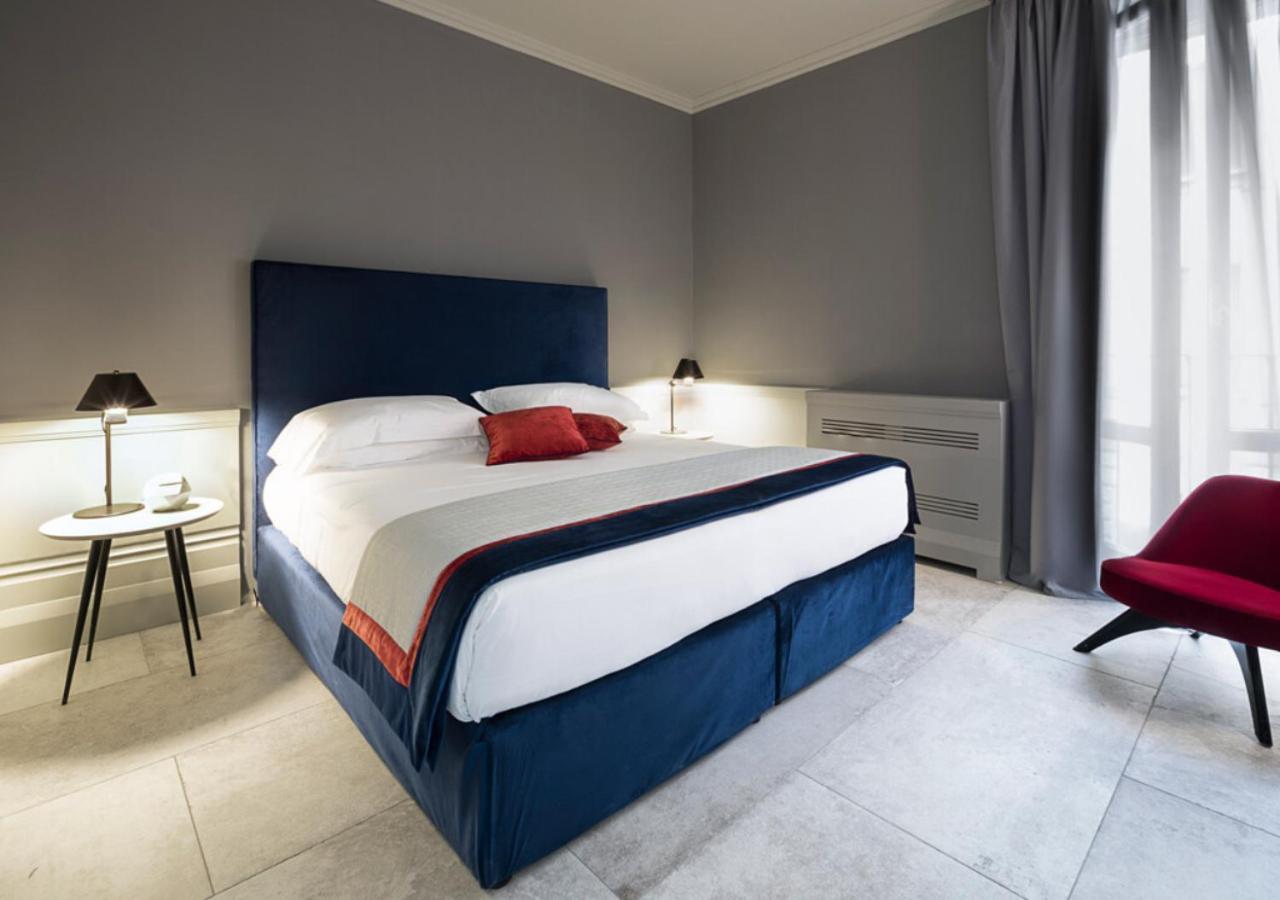 Palazzo Cornalia Hotel Milano Eksteriør billede A bedroom at the hotel