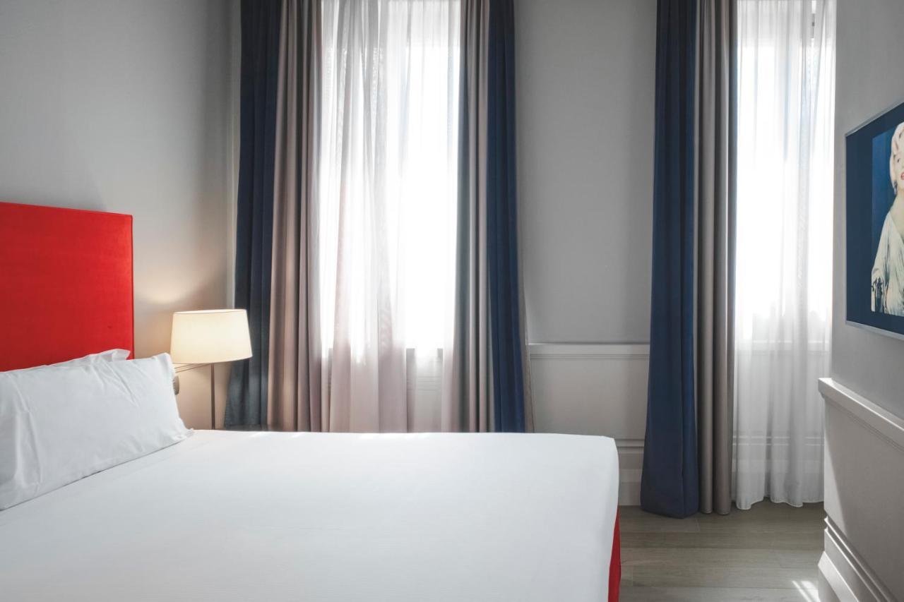 Palazzo Cornalia Hotel Milano Eksteriør billede A bedroom at the hotel
